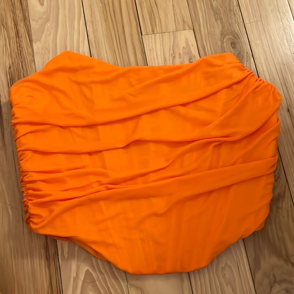 Orange strapless crop top with zip up back
